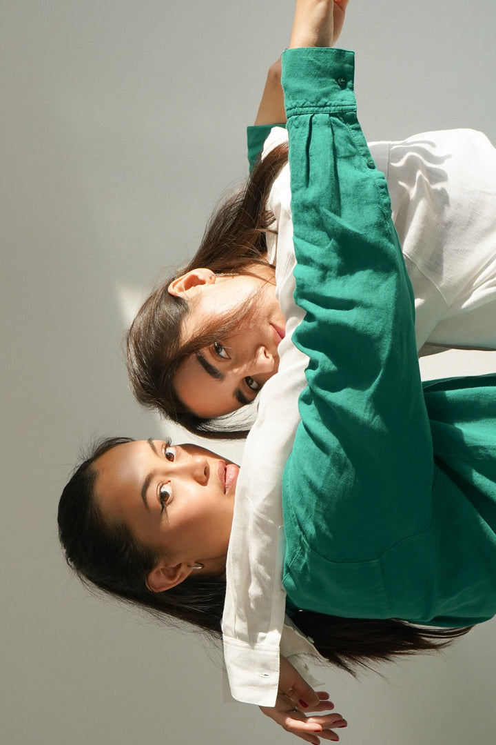 Eli and Julia wearing linen shirts